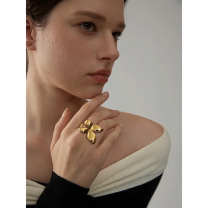 A Bague papillon ( réglable)