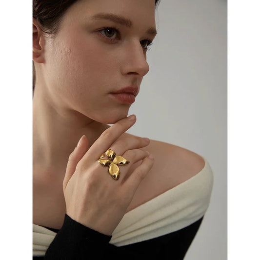 A Bague papillon ( réglable)